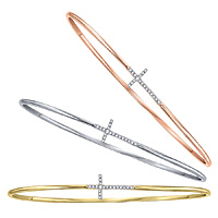 Fun, creative and playful, these diamond bangles are is an original take on the classic. Each contains 19 sparkling .10 ct tw diamonds and comes in white, yellow or rose gold. Don't be afraid to let your faith glitter and shine with these diamond bracelets shown here in white, yellow and rose gold.